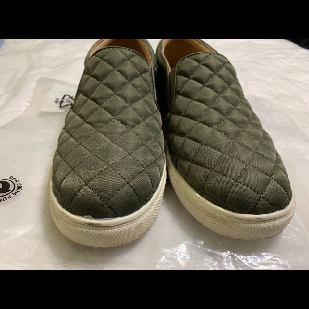 Green slip on sneakers